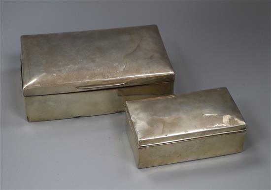 Two silver cigarette boxes, largest 23.3cm.